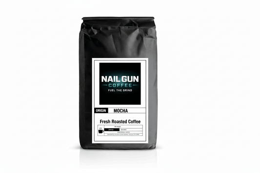 Nail Gun Coffee in a black bag on white background with Mocha flavored coffee beans 