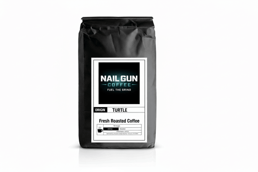 Nail Gun Coffee in a black bag on white background with Turtle flavored coffee beans 
